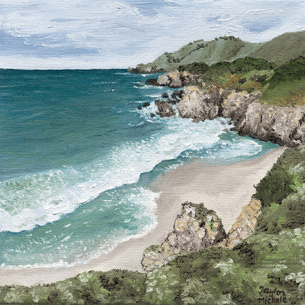 Coastal scene with beach, ocean, and rocky cliffs.