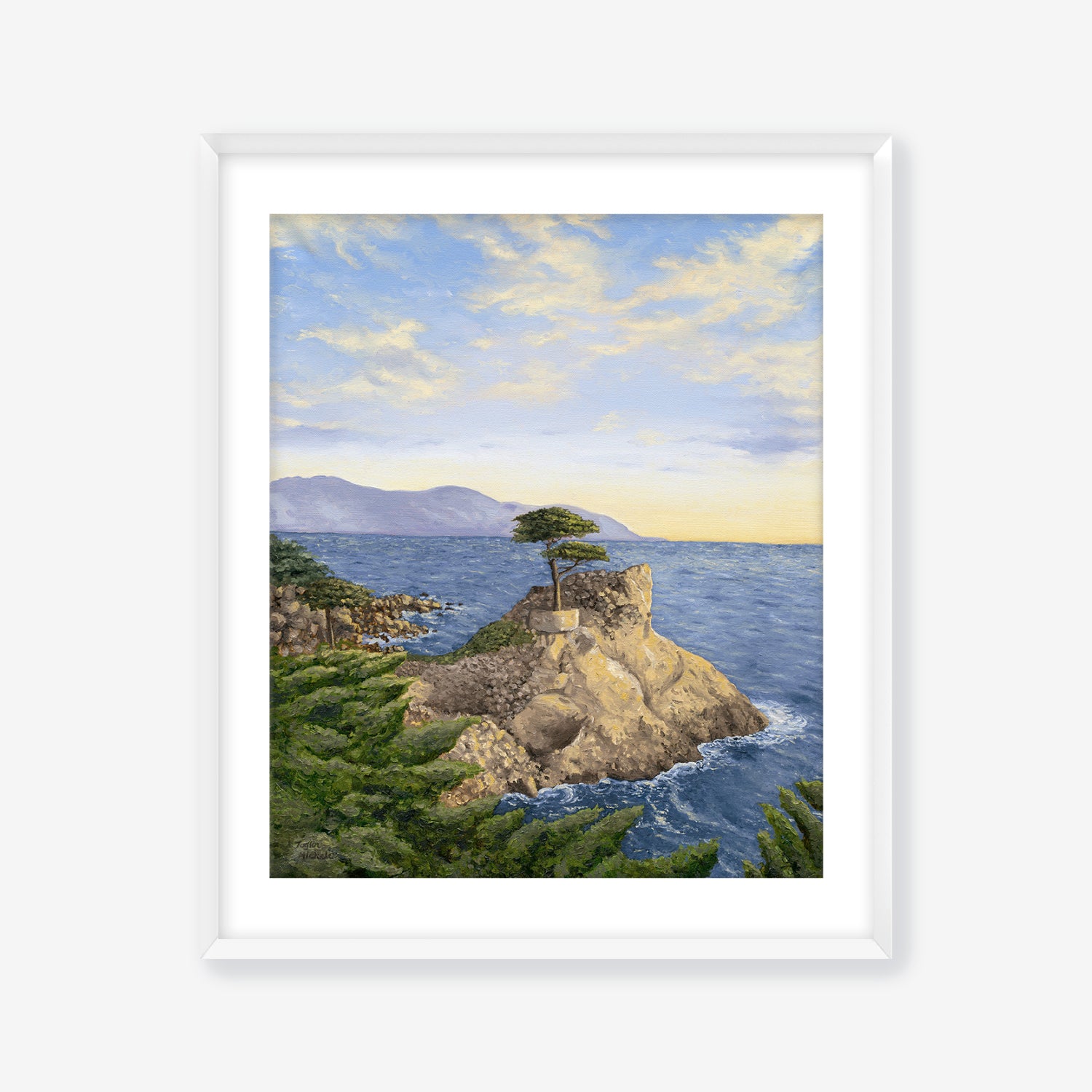 Framed artwork of a coastal scene with a tree on a rock, blue sky, and ocean. White frame