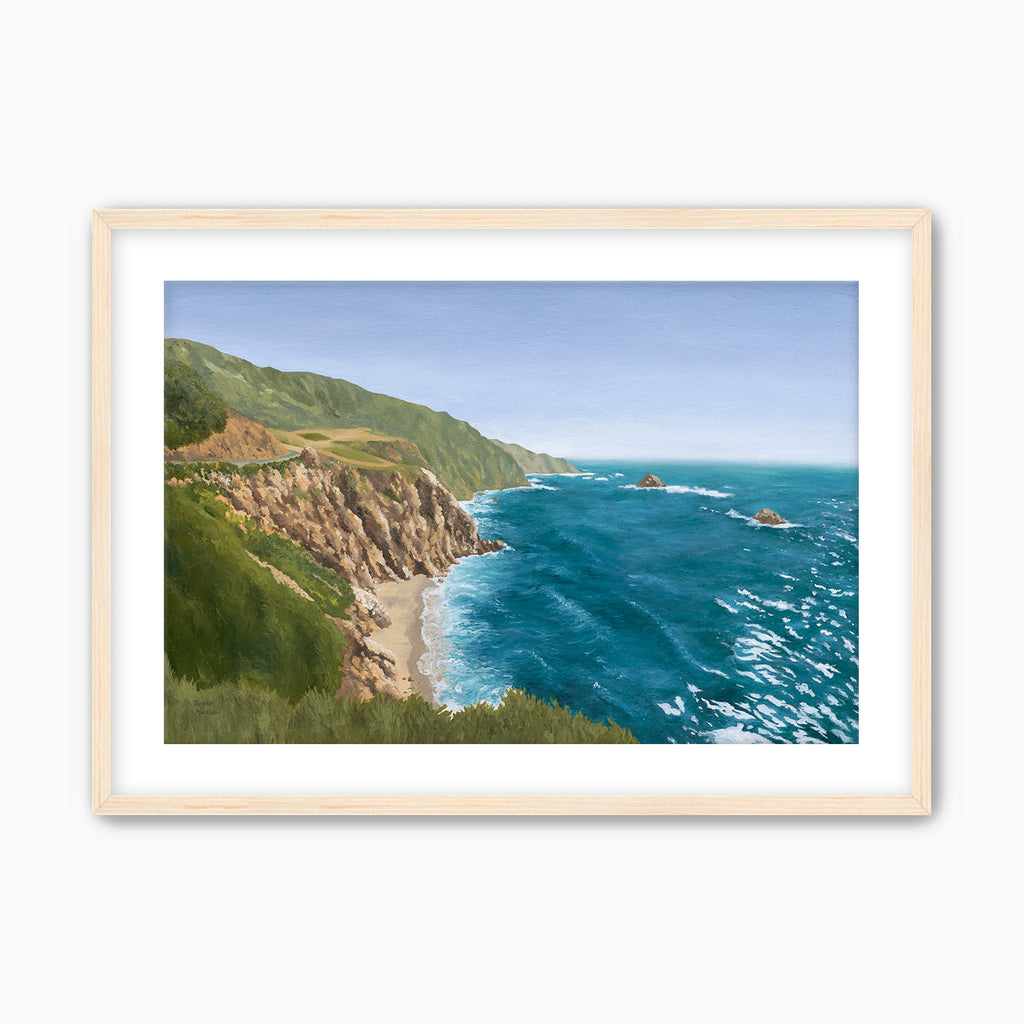 Framed Big Sur coastal landscape oil painting featuring rugged California cliffs, turquoise Pacific Ocean water, and a winding coastal highway under soft blue skies. Original seascape artwork inspired by the dramatic beauty of the California coastline. Maple solid wood frame