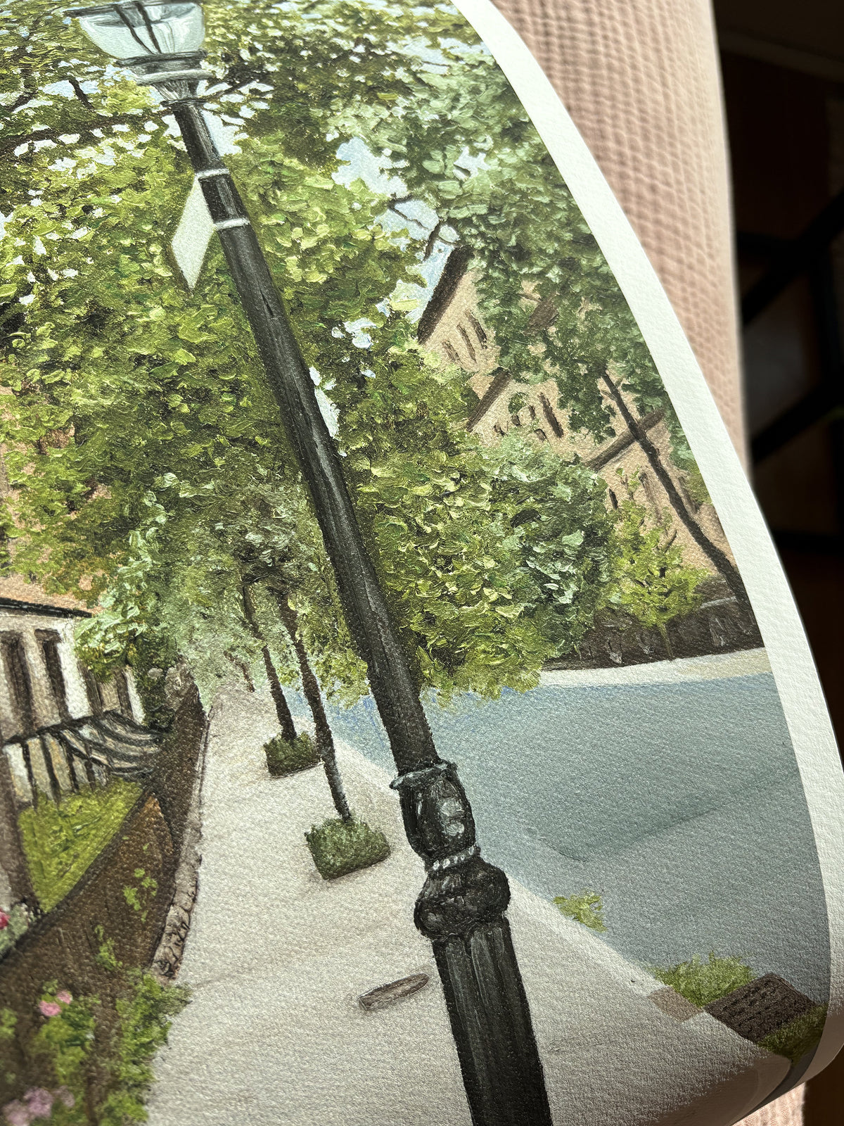 Close up detail that shows the lamp post, trees, and the road from the fine art print. 